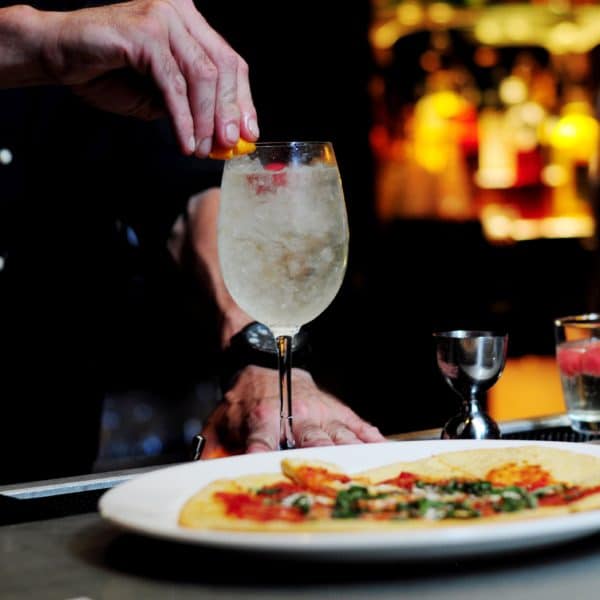 Wine Glass with appetizer at a restaurant.